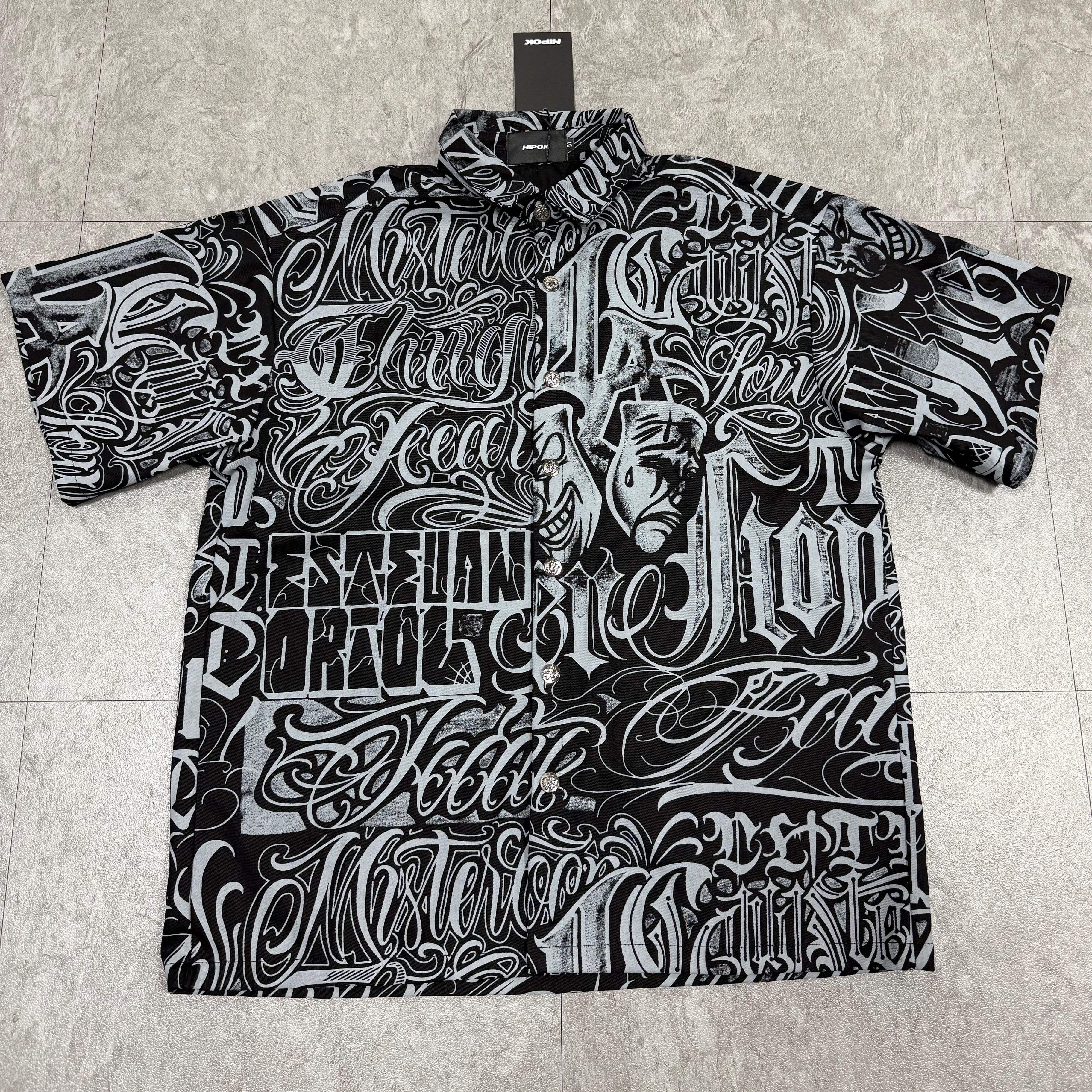Chicano shirt fully laid out on floor