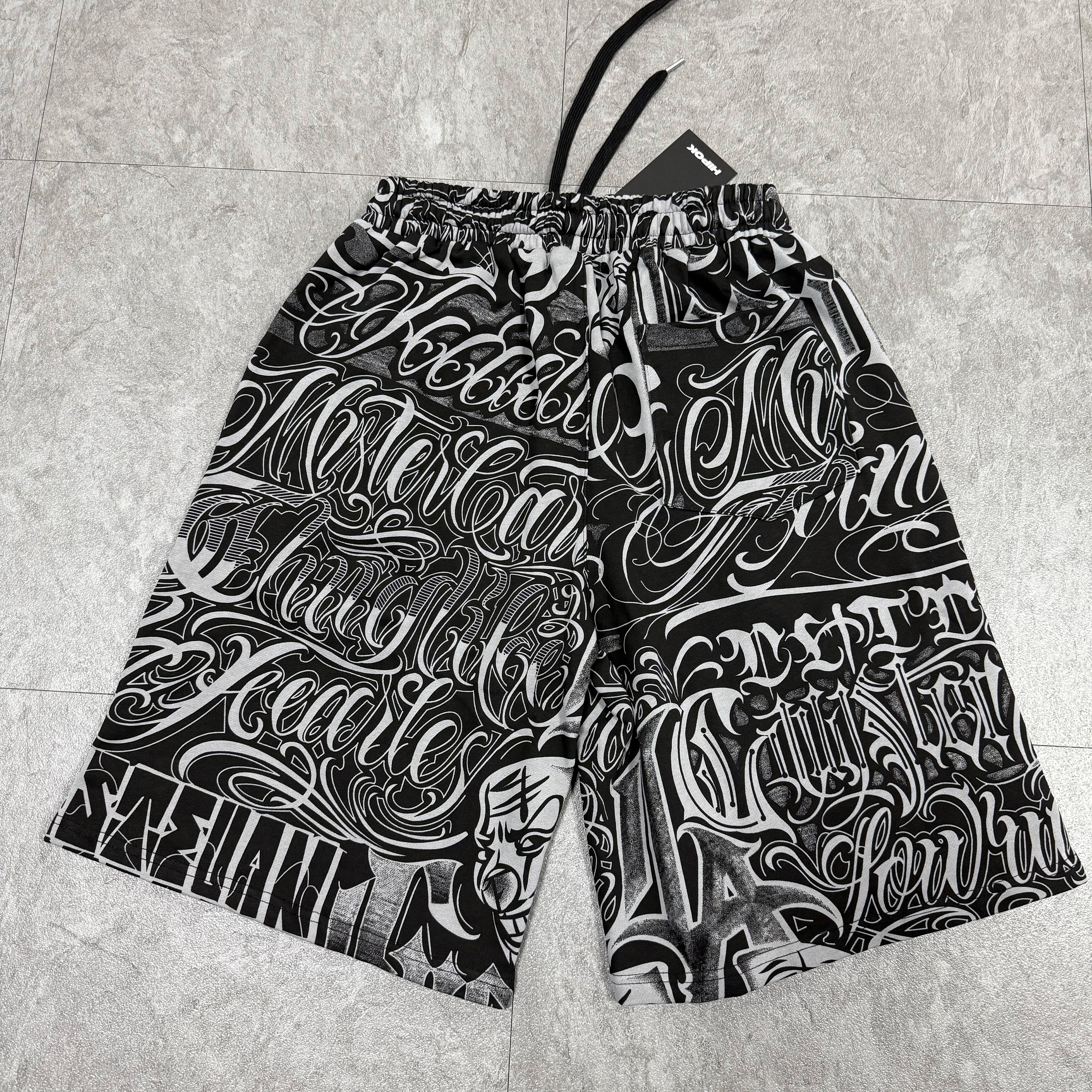Chicano shorts back fully laid out on floor